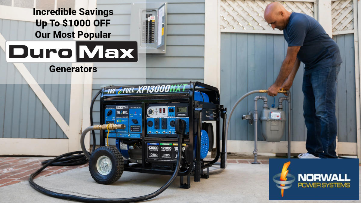 A man connects a DuroMax Tri-Fuel Generator to the natural gas connection on a gas meter. A generator cord connects the geneator to a transfer switch inlet box for home backup power. The generator is a on walkway next to the driveway. On the wall of garage is the inlet box and main circuit breaker panel. Text Reads: Incredible Savings Up To $1000 Off Our Most Popular DuroMax Generators.
