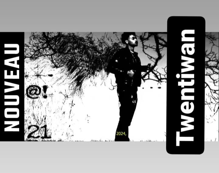 a person's cut off arm and hand holding an orange and black vinyl with the album cover showing on the left