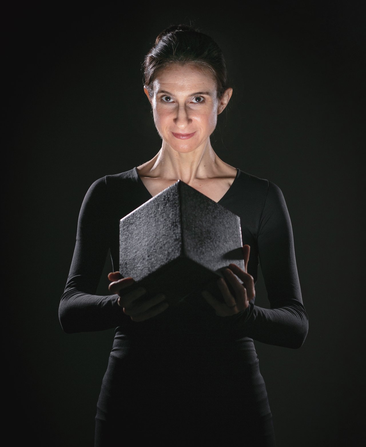Image of Cynthia Rudin holding a black box