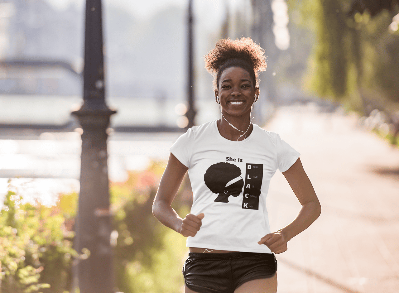 A happy woman sprinting.