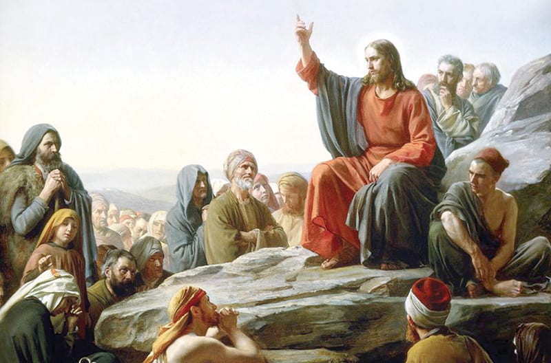 Jesus surrounded by disciples during his Sermon on the Mount