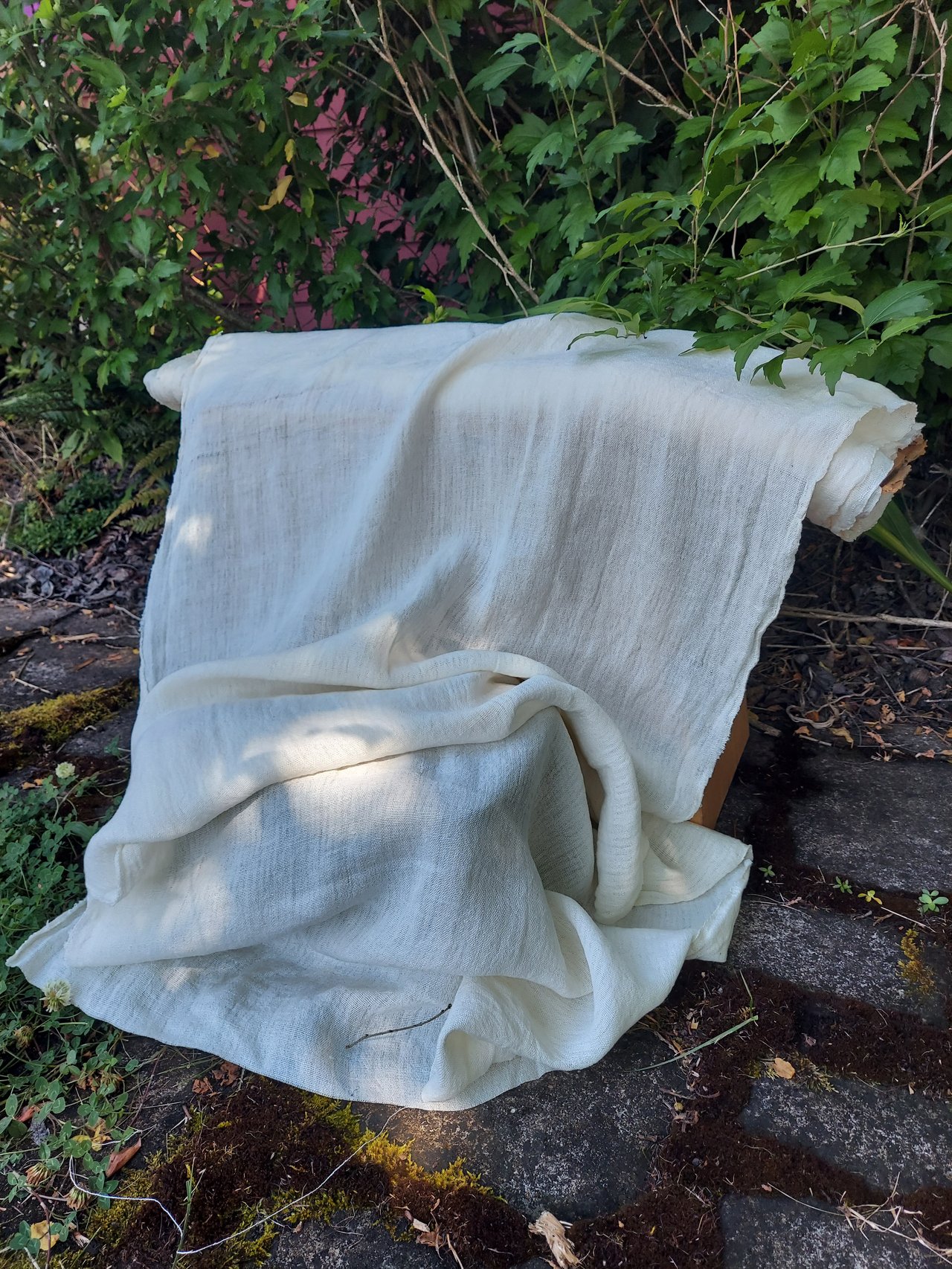 A bolt of linen fabric displays stunning drape!