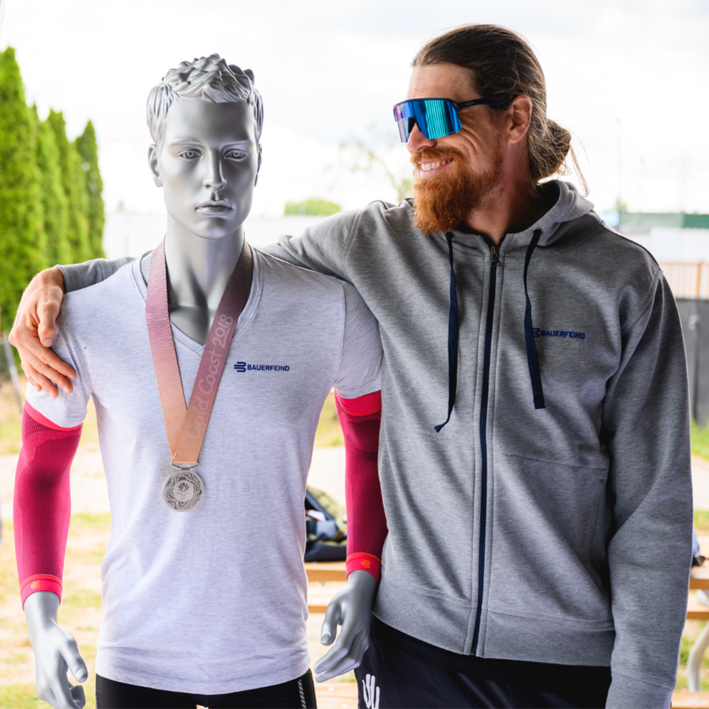 Professional athlete Sam Pedlow posing with mannequin