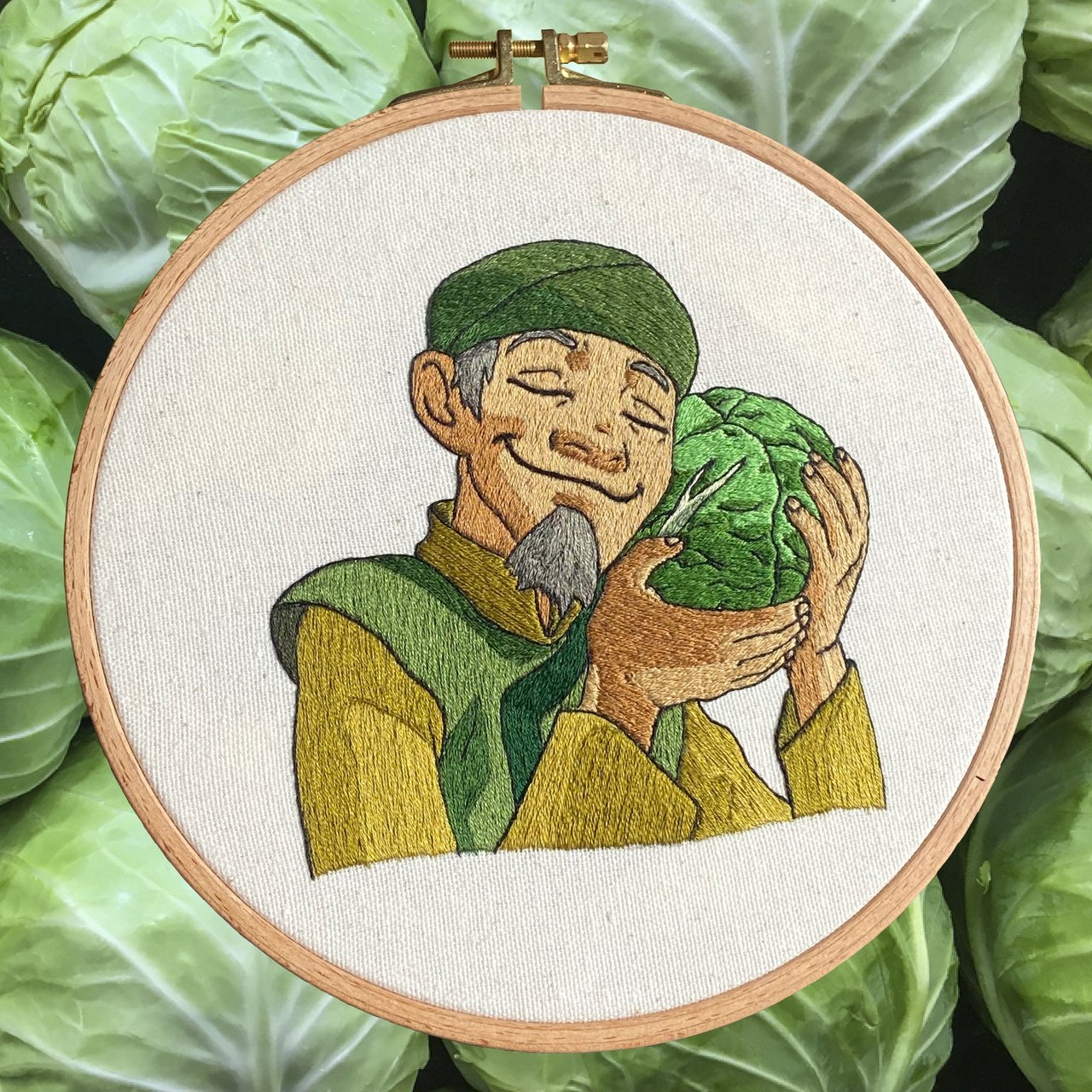 Hand embroidery art piece of the cabbage man, a character from the show called Avatar: The Last Airbender.