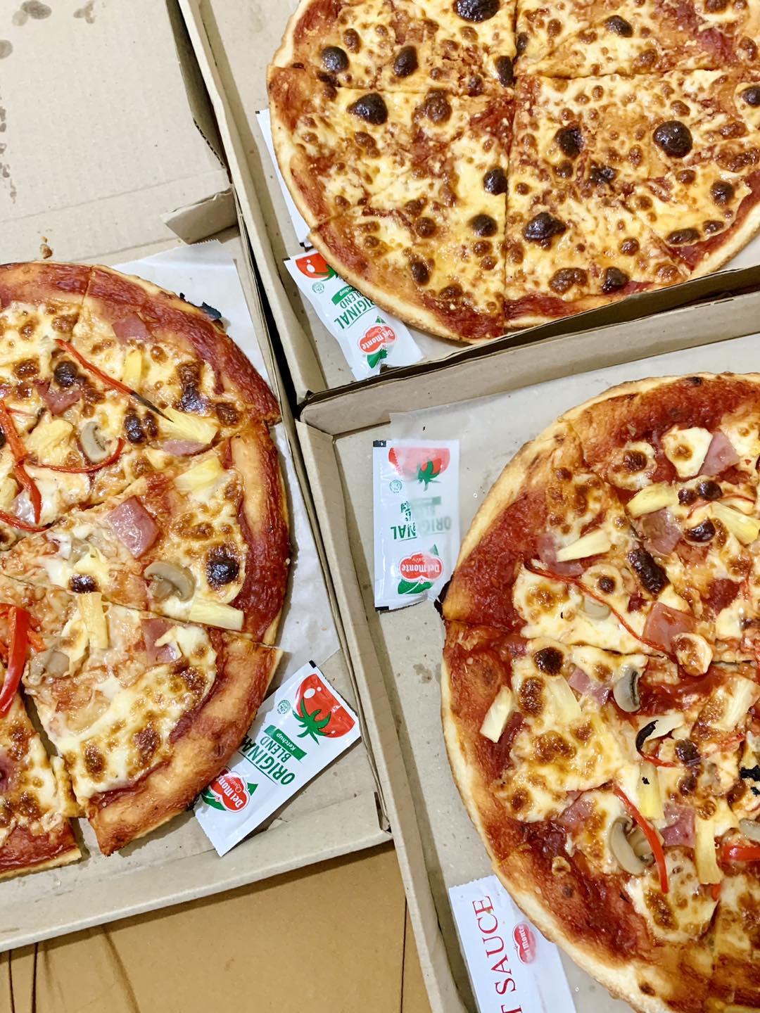 Four cheese pizza and 2 Hawaiian
