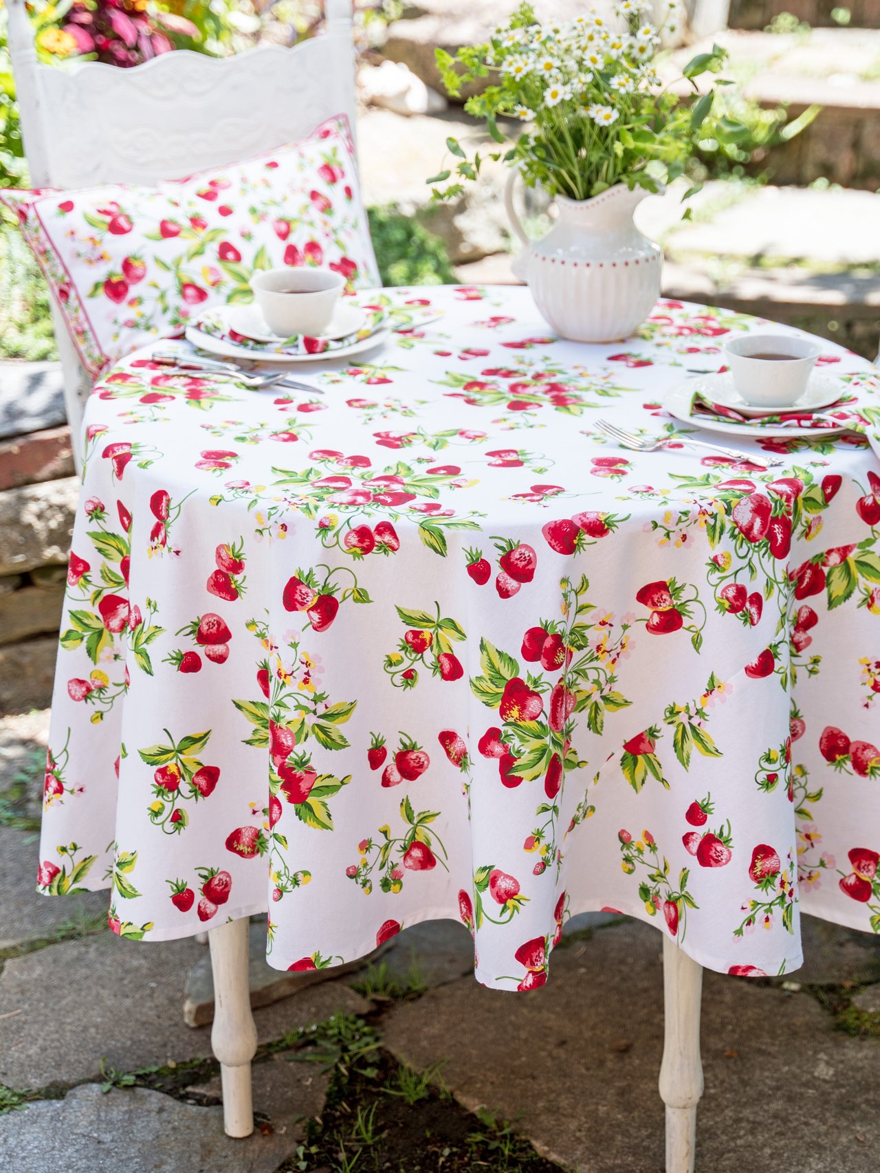 A dainty strawberry-printed tablecloth