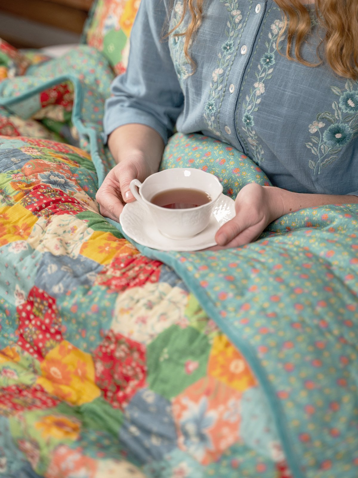 A closeup of a floral bedspread 