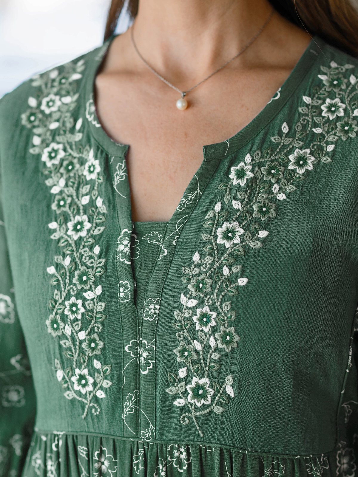A beautiful vintage-inspired dress with a soft floral print