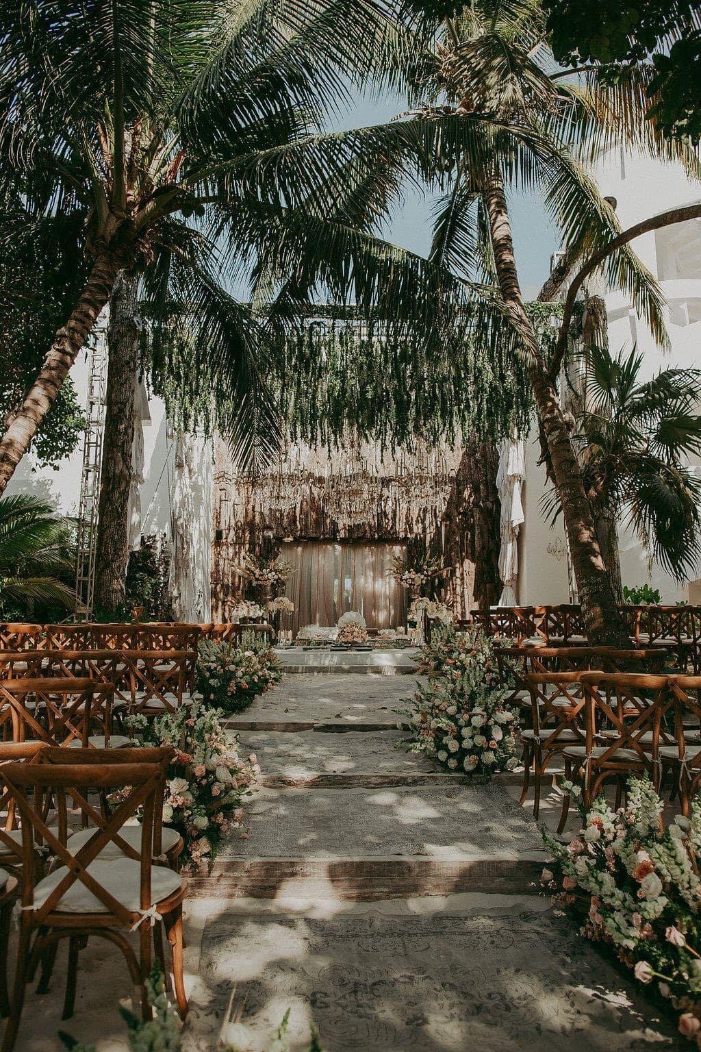 A dreamy over head shot of a beach wedding ceremony.