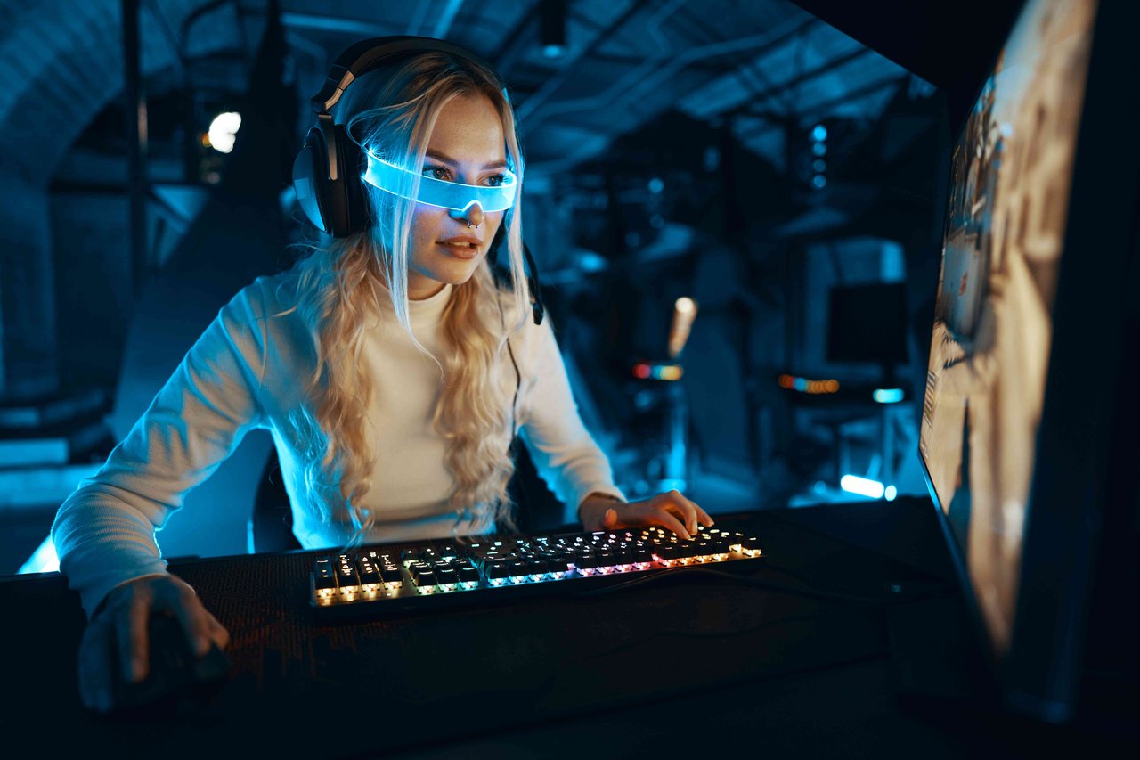 woman playing on desktop pc cool glasses futuristic new tech.