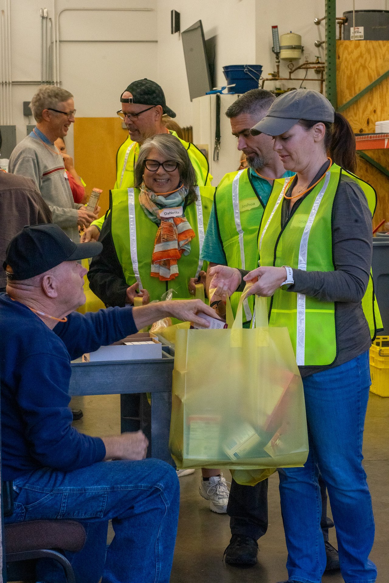 A group of volunteers at the thanksgiving food basket giveaway