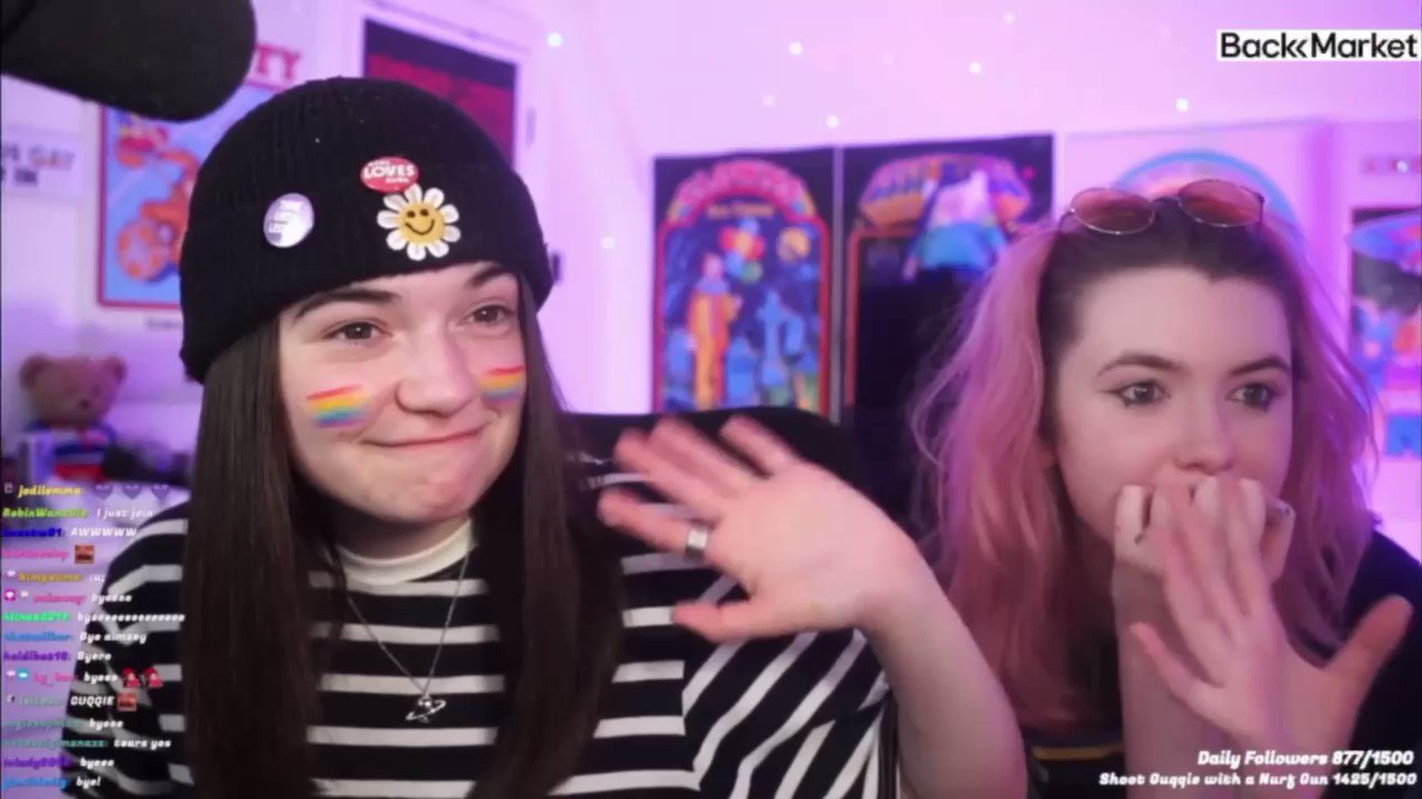 A pug dog wearing a yellow hat.