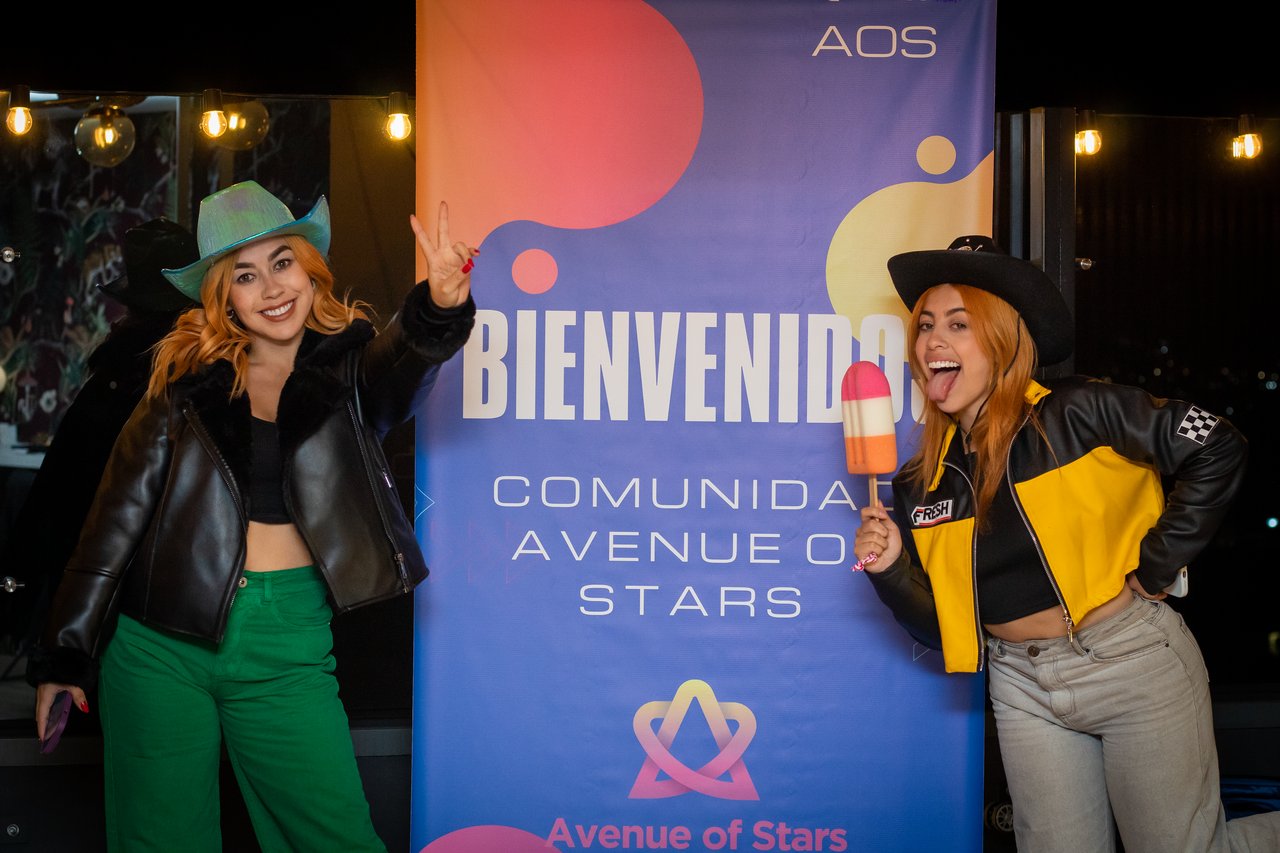 A woman with her hands together in prayer position, with her eyes closed