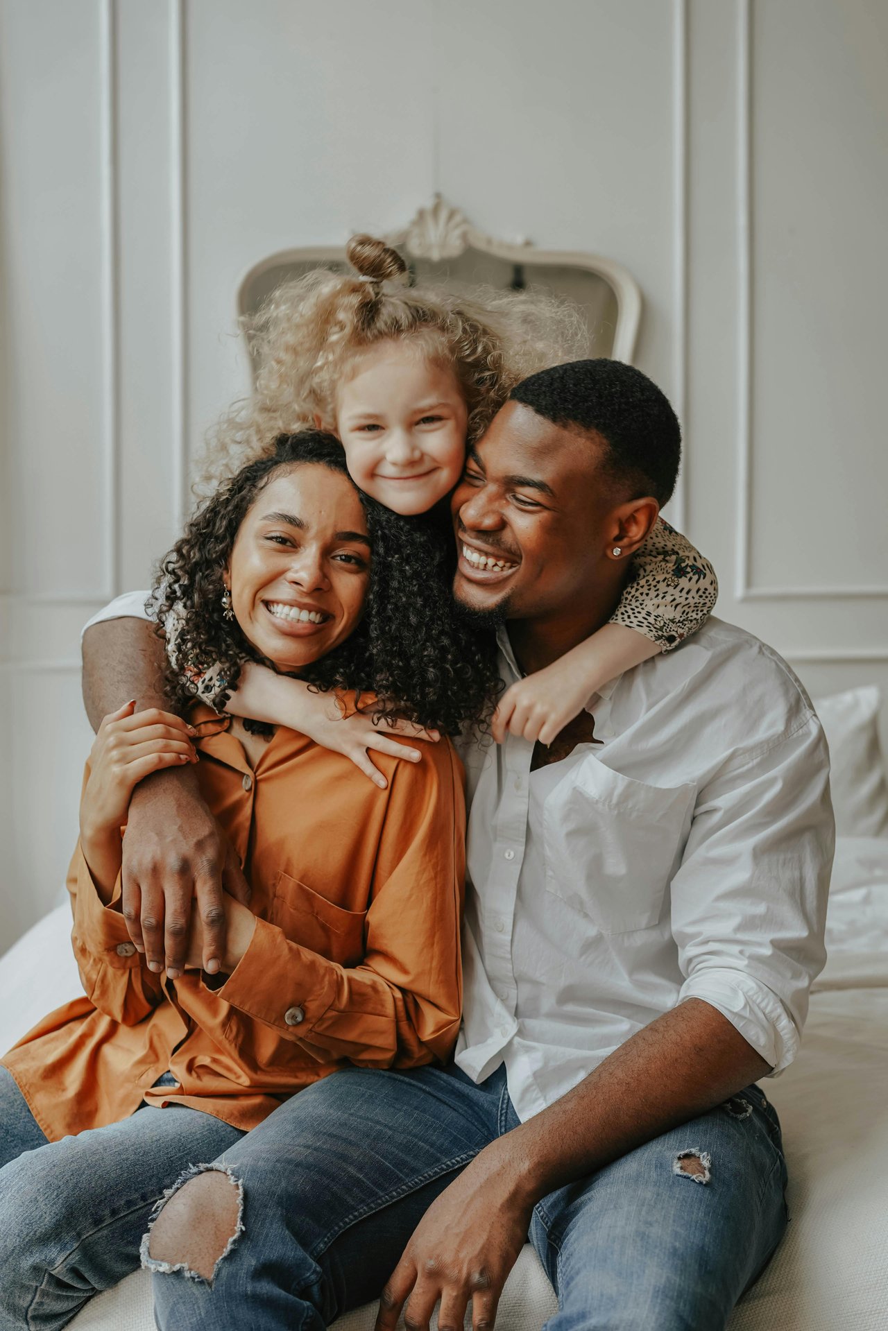 mixed race family smiling