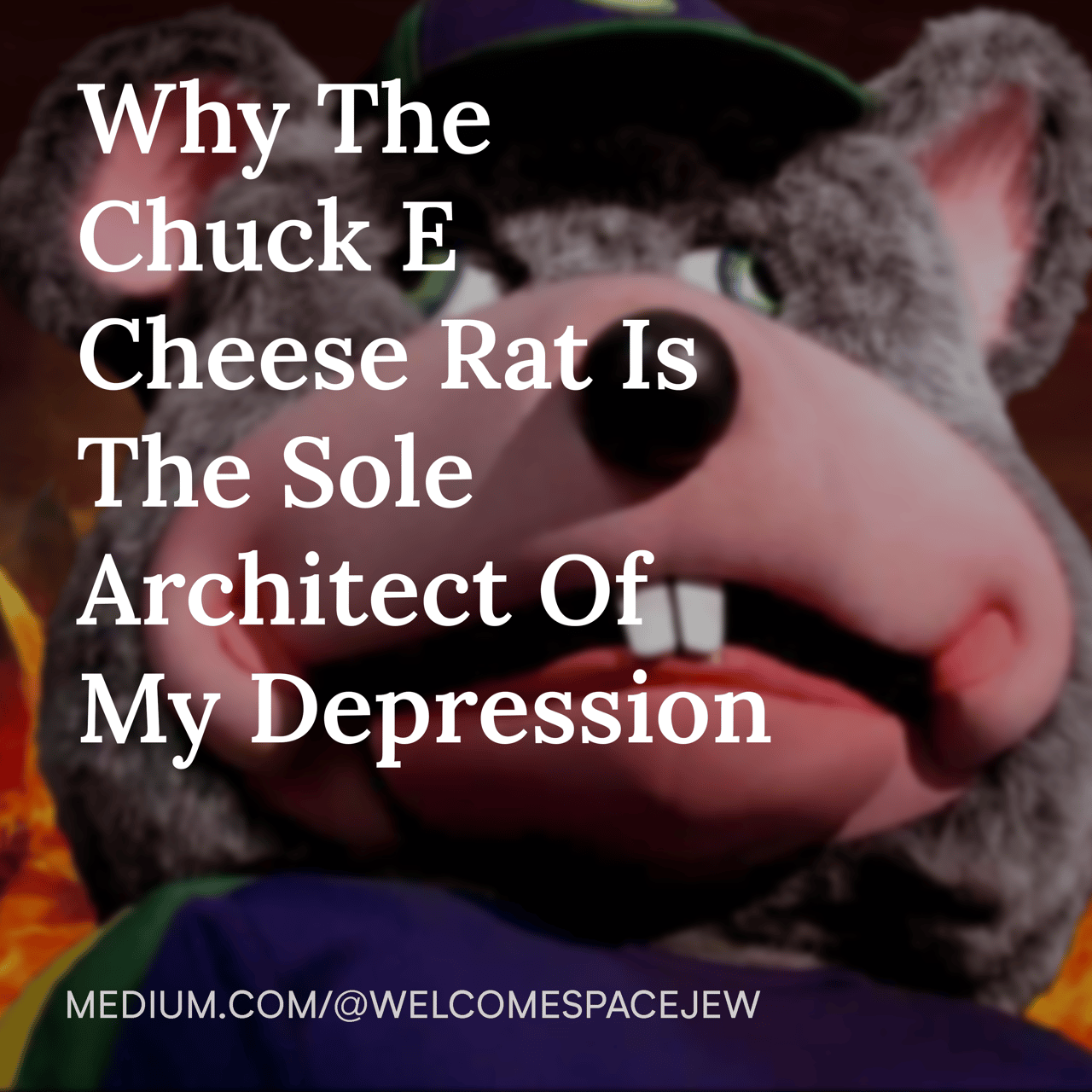 Chuck E Cheese menacingly looks on in front of the hell, his eyes pointed in different directions. The articles titled overhead: "Why The Chuck E Cheese Rat Is The Sole Architect Of My Depression"