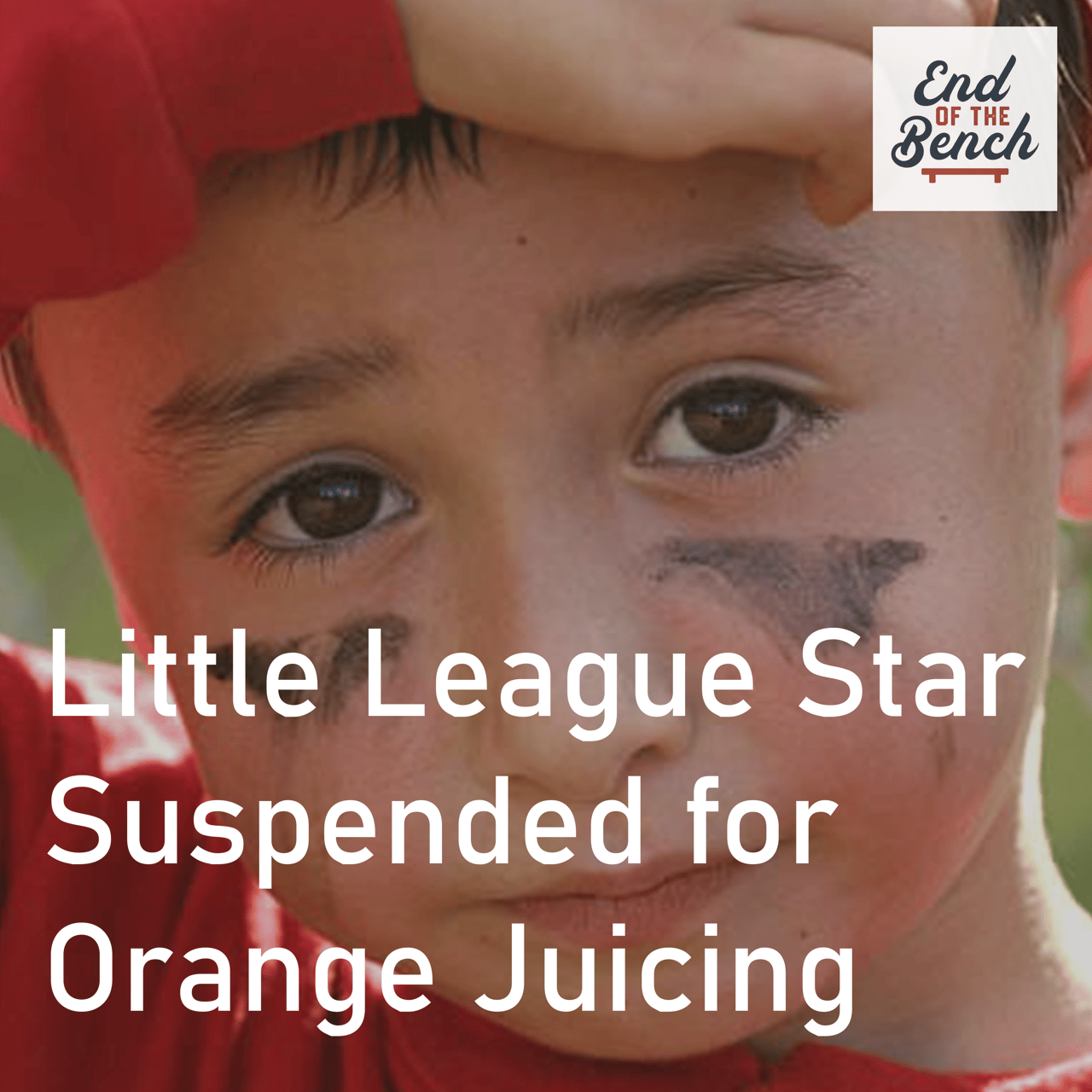 A child looks listlessly forward wearing baseball attire. The article's is overlain atop and says "Little League Star Suspended for Orange Juicing"