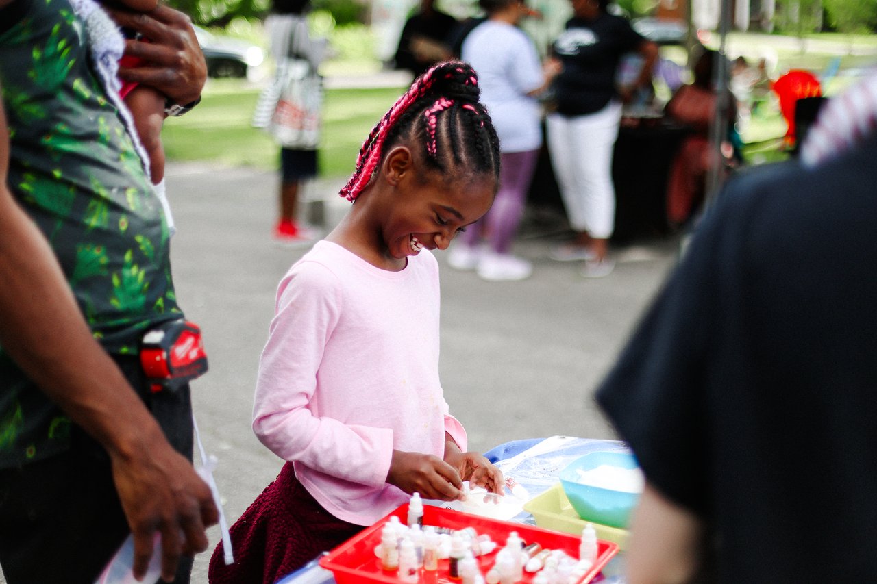 Child enjoying science activity at Detroit event