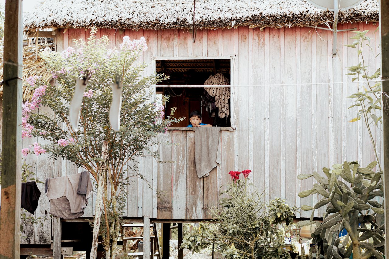A boy in a Amazonian home
