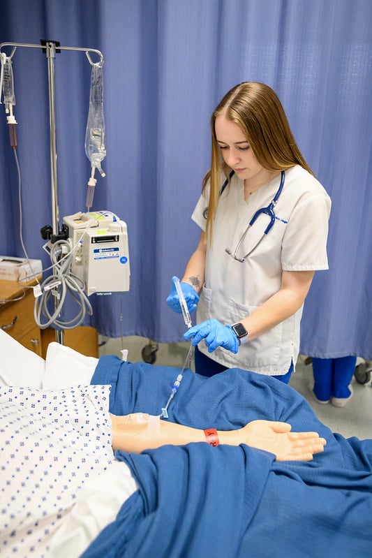 Nursing student caring for 