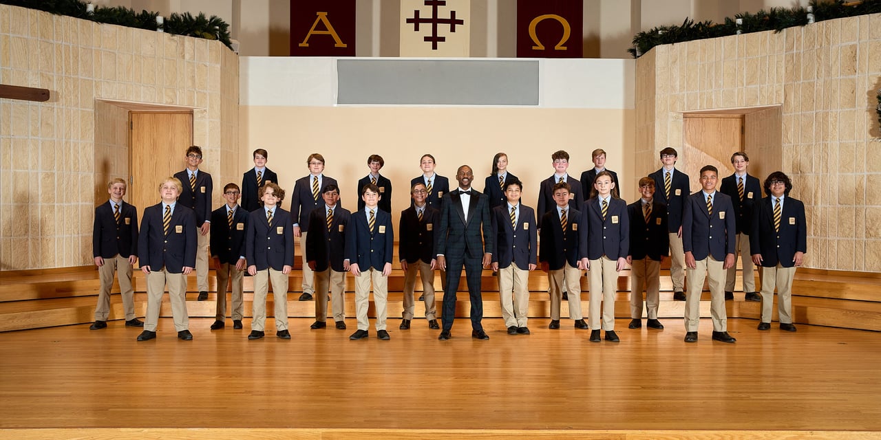 The Phoenix Boys Choir on the Stage of Camelback Bible Church, accompanied by their Artistic Director, Mr. Herbert Washington