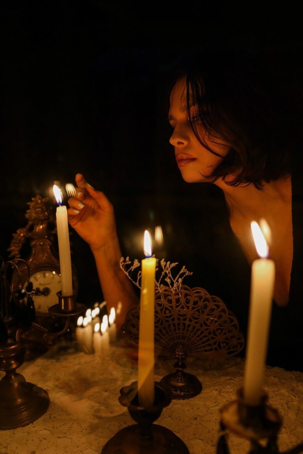 Laura and James sharing a cute moment in the fall in a forest