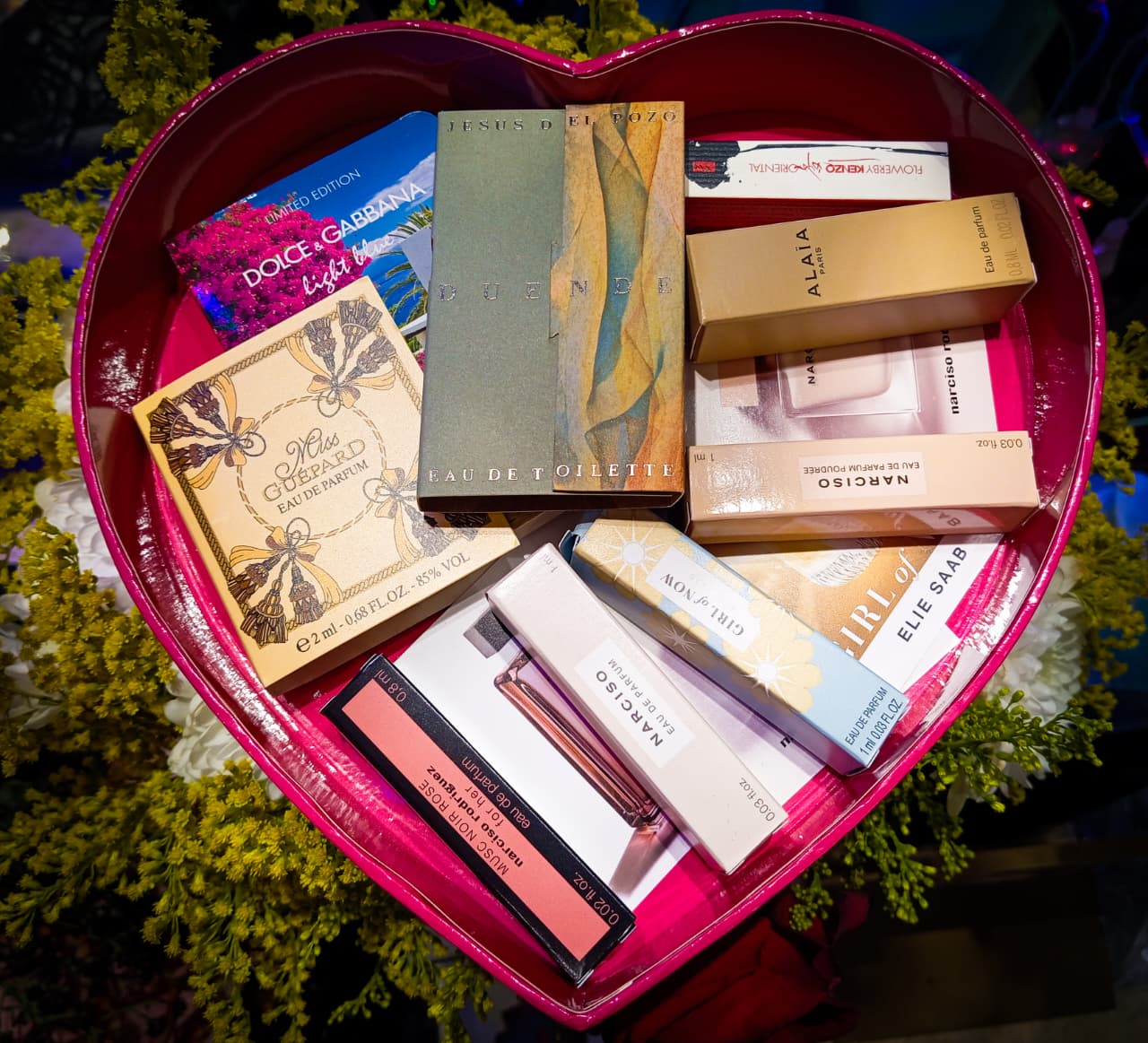 Heart-shaped gift box filled with luxury mini perfumes including Dolce & Gabbana, Elie Saab, Narciso, and Jesus Del Pozo at Palais des Parfums Port Said.