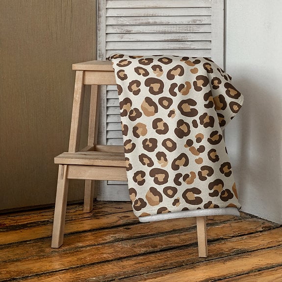Wildly Comfortable: The Bold Leopard Print Towel Experience Embrace your wild side with the bold leopard print towel, a perfect blend of style and comfort. This eye-catching towel brings a splash of safari-inspired flair to your bathroom or beach day, making every dry-off feel like a chic adventure. Crafted from soft, absorbent cotton, it offers a plush touch that wraps you in cozy warmth while efficiently soaking up moisture.