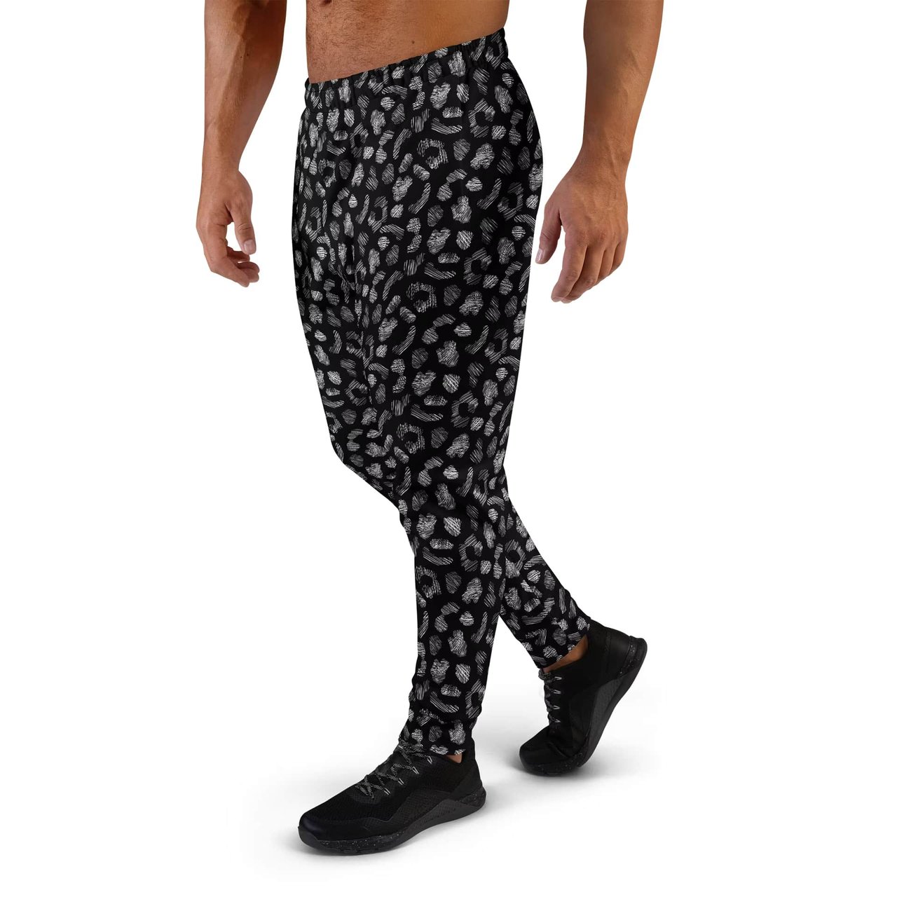 Discover comfortable recycled men's joggers with bold black leopard print perfect for eco-conscious style and standout comfort. Shop your pair today!