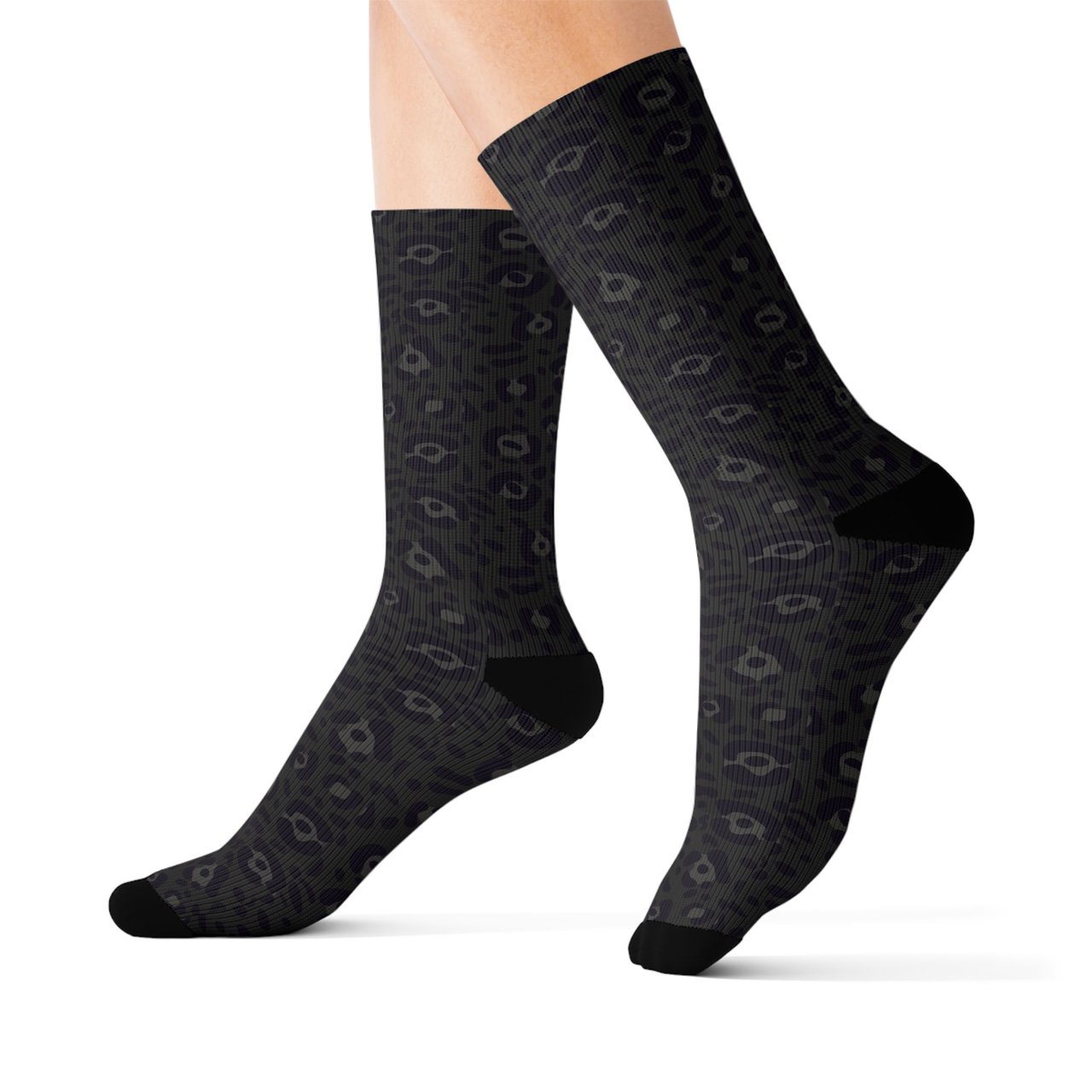 Buy Comfortable Bold Black Leopard Print Crew Socks for Sale Online! Step up your sock game with these comfortable bold black leopard print crew socks. Designed to combine style and comfort, these socks feature a striking leopard pattern in classic black tones that adds a touch of wild flair to any outfit.