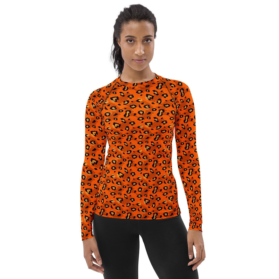 Discover the perfect blend of style and performance with our Stylish Orange Leopard Print Women's Rash Guard. Designed for active women who want to stand out, this rash guard features a vibrant orange base accented with bold leopard print patterns that add a fierce, fashionable edge.