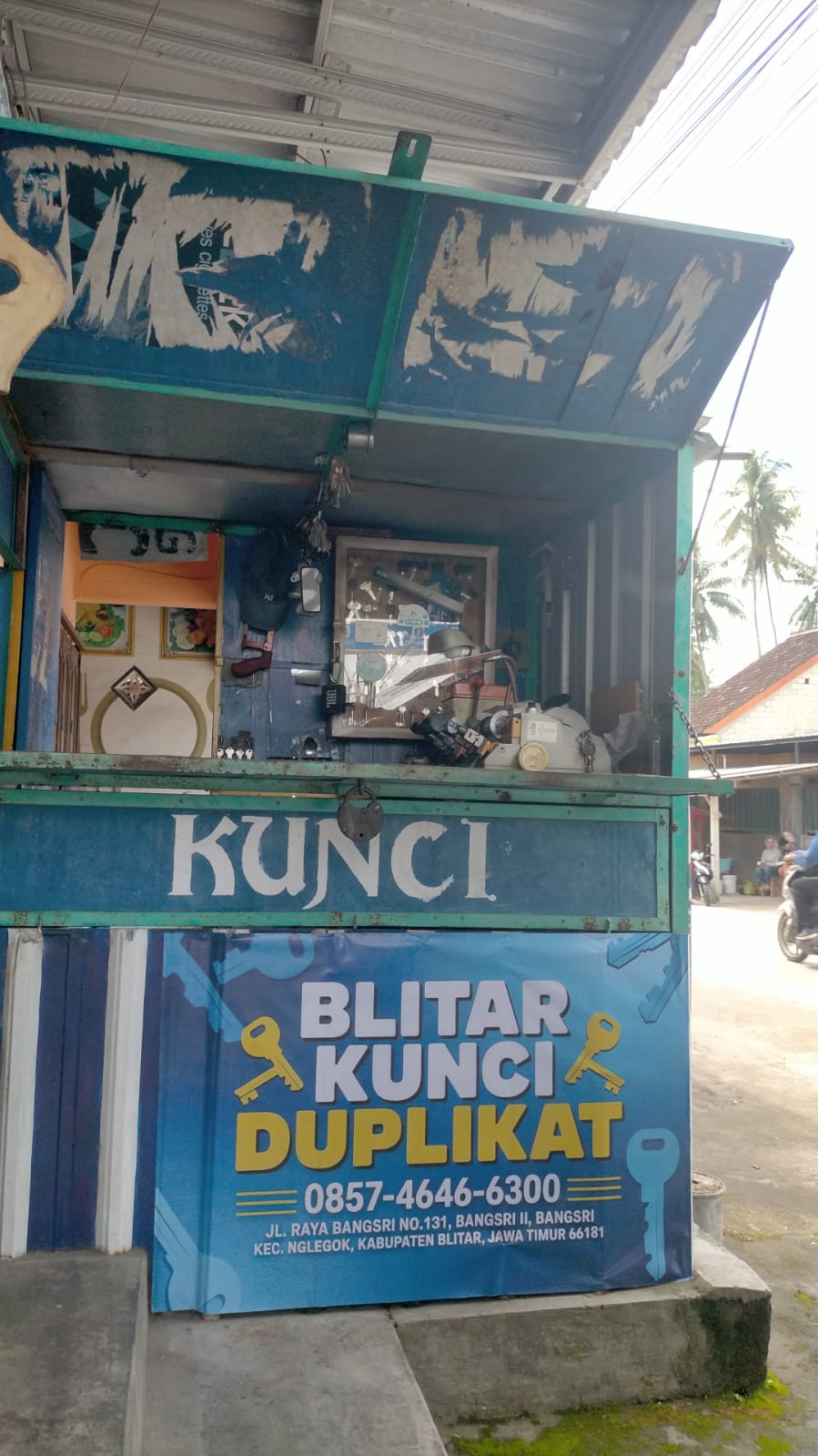 A pug dog wearing a yellow hat.