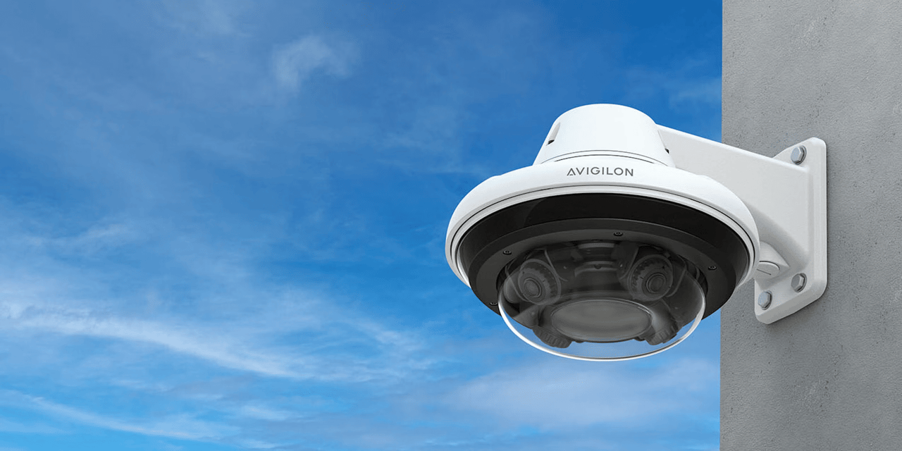 A pug dog wearing a yellow hat.