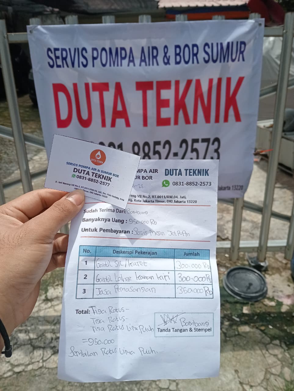 A pug dog wearing a yellow hat.