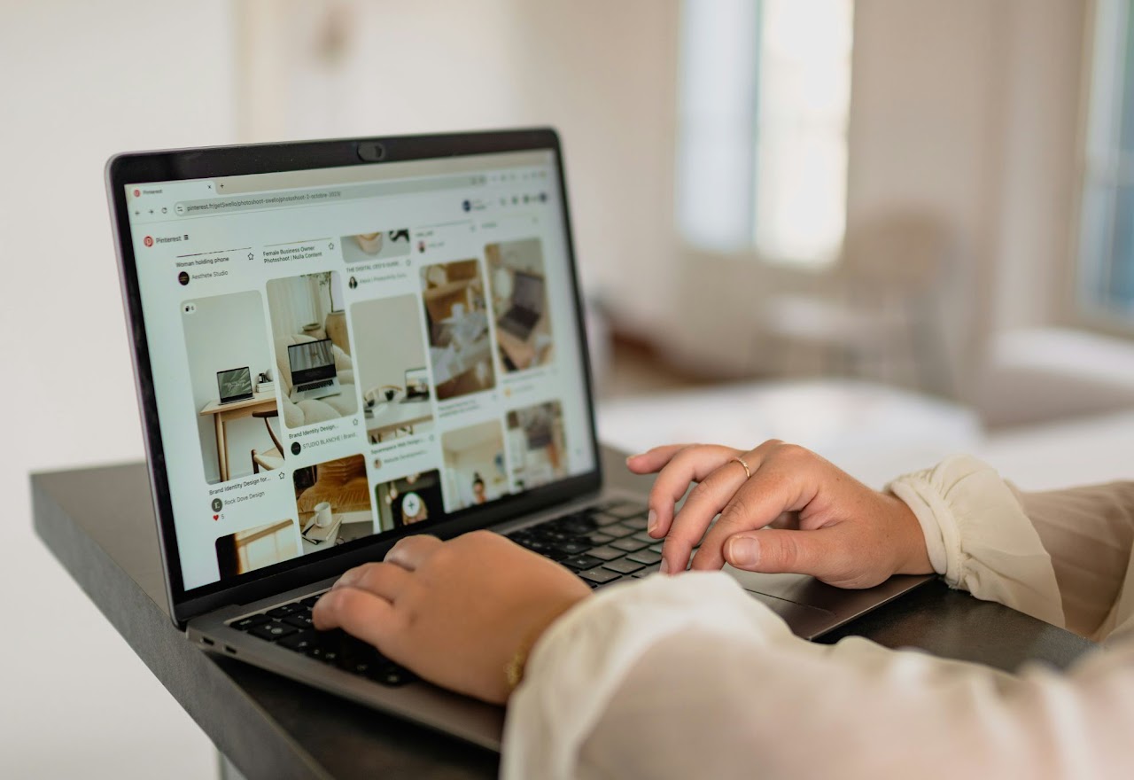 A pug dog wearing a yellow hat.