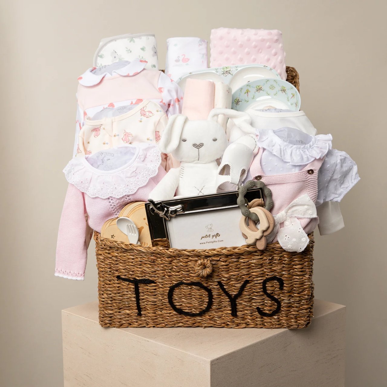 A pug dog wearing a yellow hat.