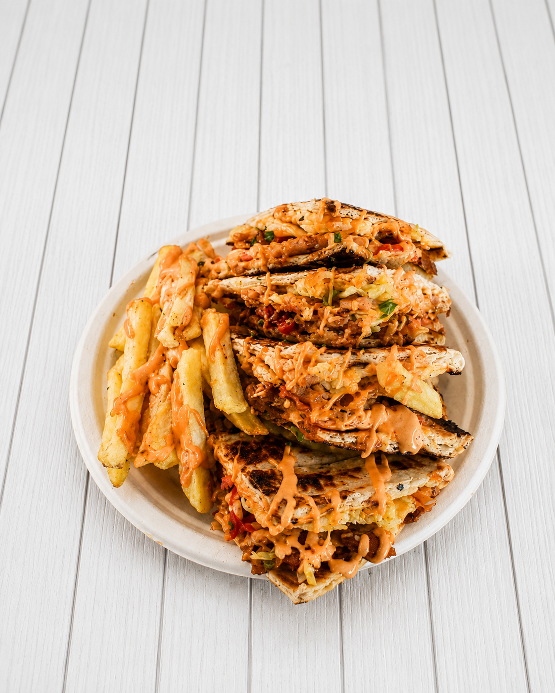 Freshly prepared Greek street food from Athens Original Gyros, served with authentic Mediterranean flavours in Camden Market, London.
