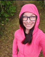 Midlife female smiling, welcoming the world