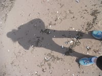 My shadow on a beach