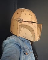 LOCCASION owner with an handmade Mandalorian recycled helmet