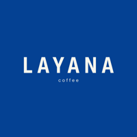 Layana Artisan logo with beige background, blue and orange colored font