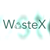 A young woman with brown hair and brown eyes in a flower shop, smiling and holding a rose close to her face