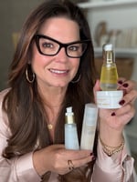 sonia roselli holding skincare