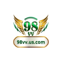 A young woman with brown hair and brown eyes in a flower shop, smiling and holding a rose close to her face