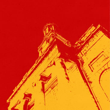 Red and yellow duotone photo of Aberdeen Arts Centre's exterior, shot from below looking up at its ornate stonework.
