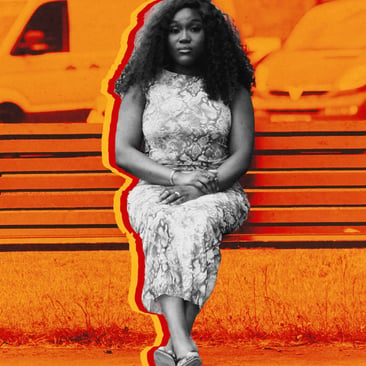 Woman in a lace dress sitting on a bench, shown in black and white with a red and yellow outline against an orange-toned street scene.