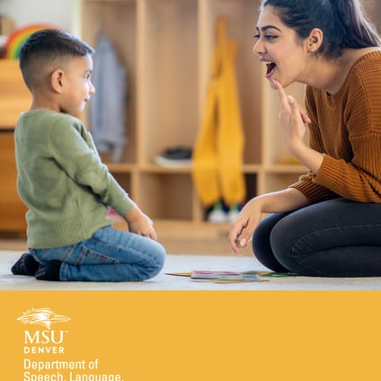 Adult demonstrating mouth positioning to a young child during a speech-language learning activity in a classroom. MSU Denver Department of Speech, Language, Hearing Sciences branding at bottom.