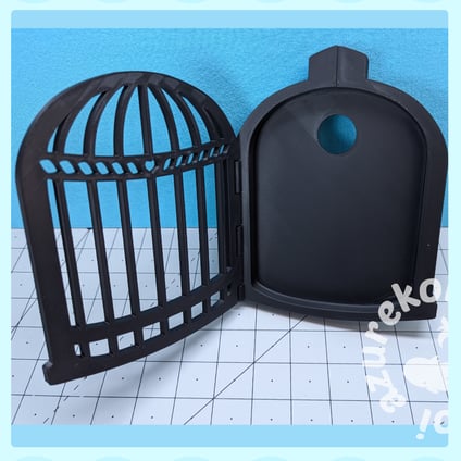 embroiery hoop shaped like a bird cage with door