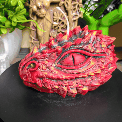 El Ojo del Dragón red dragon eye candle by Bruja's Flame, luxury witchy candle for witchcraft decor, gothic home decor, altar decoration, pagan gifts, fantasy candle, occult decor, dragon lover gift, handcrafted beeswax soy candle.